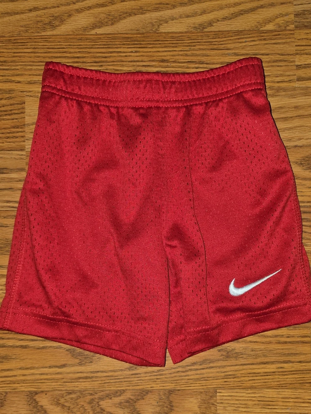 Nike Red Kids' Athletic Shorts with White Swoosh Accent